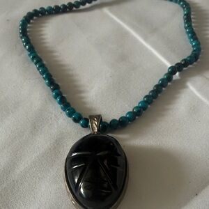 Turquoise Beaded Necklace with Black Face Carved Pendant